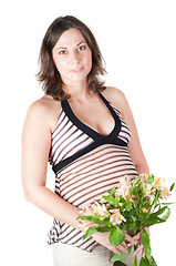 Image showing Portrait of pretty pregnant woman with flowers