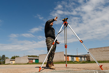 Image showing Land surveyor on construction site