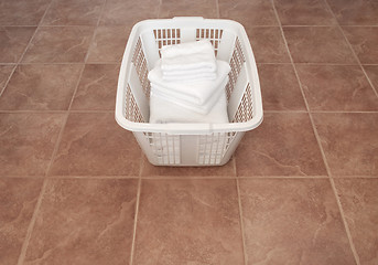 Image showing Clean white towels in a laundry basket