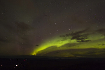 Image showing Emerging aurora arc with meteor