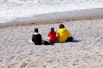Image showing three children on the beach