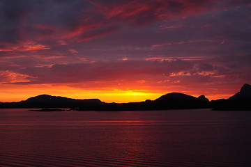 Image showing sunset view from a boat off the coast of norway