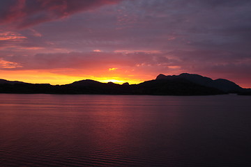 Image showing sunset view from a boat off the coast of norway