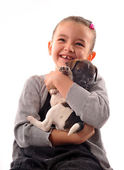 Image showing child and puppy