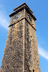 Image showing Historic clock tower against blue sky