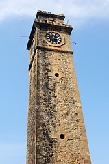 Image showing Historic clock tower against blue sky