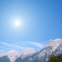 Image showing the sun in the mountain country
