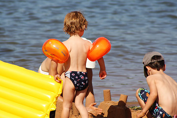 Image showing children playing in the sand