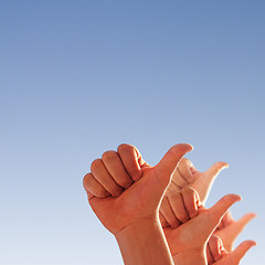 Image showing hands on a blue background