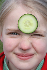 Image showing child and cucumber