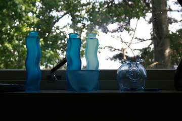 Image showing blue bottles