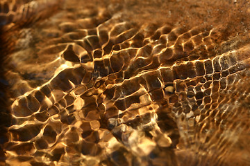 Image showing gold water