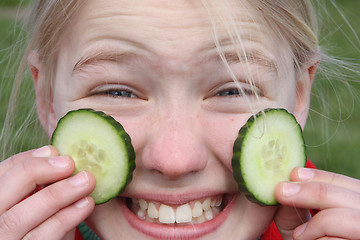 Image showing child and cucumber