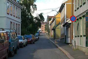 Image showing Street with small houses and cars