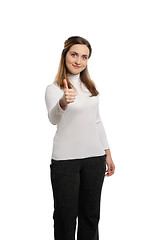 Image showing Young beautiful woman thumbs up