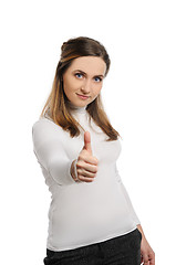 Image showing Young beautiful woman thumbs up