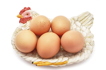 Image showing Eggs on decorative hen nest