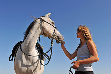 Image showing teen and arabian horse