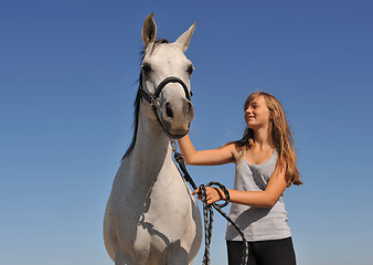 Image showing teen and arabian horse