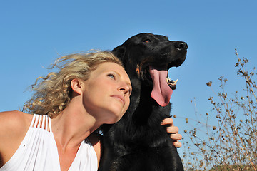 Image showing woman and beauceron