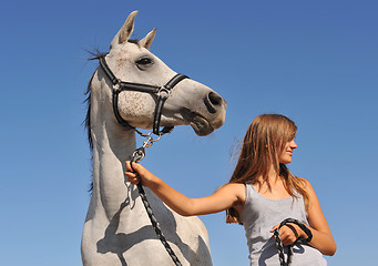 Image showing teen and arabian horse