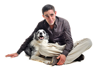 Image showing border collie and man