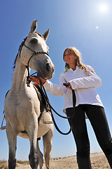 Image showing teen and horse