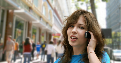 Image showing City girl talking on the phone