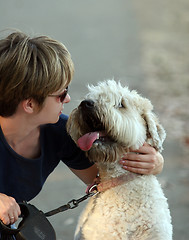 Image showing Woman with her dog in the park