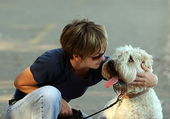 Image showing Woman with her dog in the park