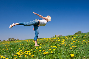Image showing young woman exercising yoga