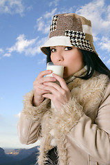 Image showing Female with glass of milk