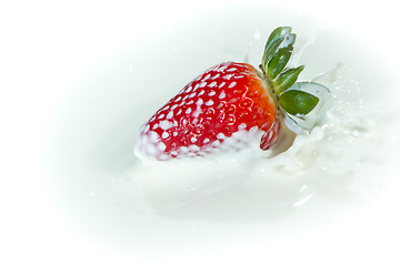 Image showing strawberry splashing into milk