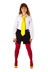 Image showing Young girl in red stockings and a yellow tie