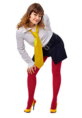 Image showing Young girl in red stockings and a yellow shoes