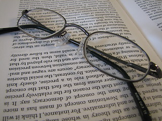 Image showing Glasses on a book