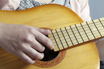 Image showing Playing the guitar