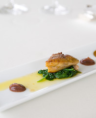 Image showing Goose liver on spinach