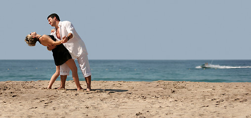 Image showing Couple dancing on the beach