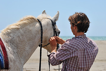 Image showing man and horse