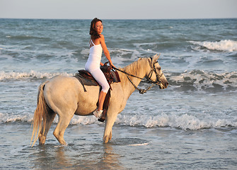 Image showing riding woman in sea