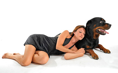 Image showing sleeping woman and rottweiler