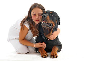 Image showing child and rottweiler