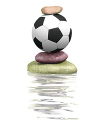 Image showing Soccer ball and stones