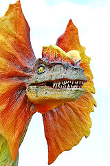 Image showing Dilophosaurus dinosaur with orange collar