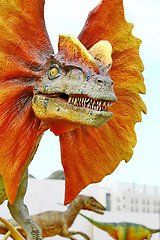 Image showing Dilophosaurus dinosaur with orange collar