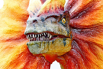 Image showing Dilophosaurus dinosaur with orange collar