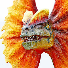 Image showing Dilophosaurus dinosaur with orange collar