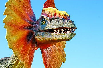 Image showing Dilophosaurus dinosaur with orange collar