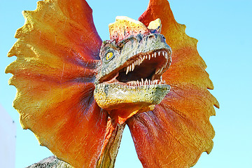 Image showing Dilophosaurus dinosaur with orange collar